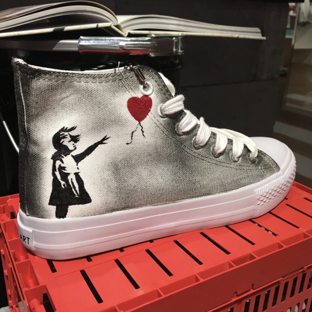 elongi series – meet the face – the art of banksy